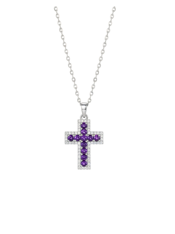 Silver cross pendant with purple gemstones on a white background